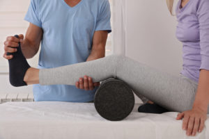 Chiropractor Helping with Running Pains